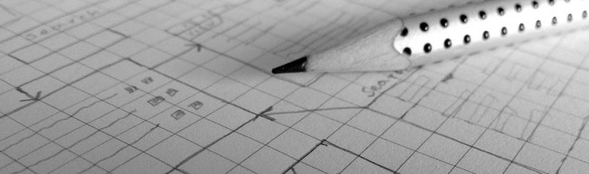 Lapis o matita appoggiato su foglio di progetto in bianco e nero