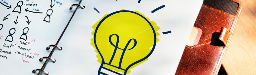 Consumatore: agenda su cui è disegnata una lampadina accesa che rappresenta un'idea